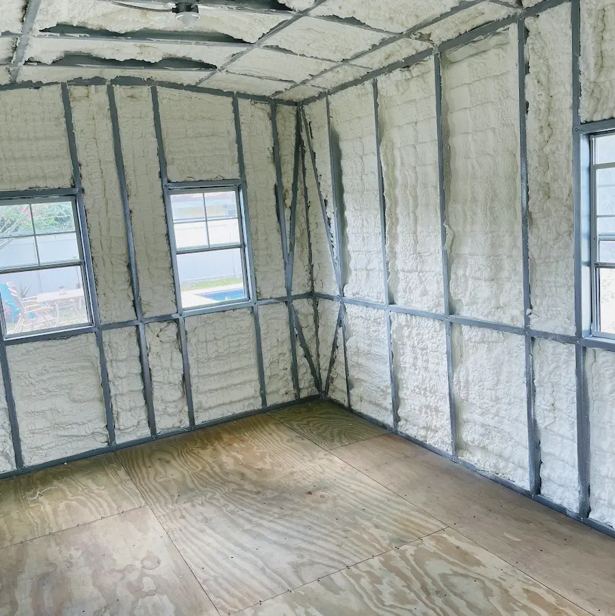 Closed-cell spray foam insulation applied to wall cavities in a residential project in San Luis